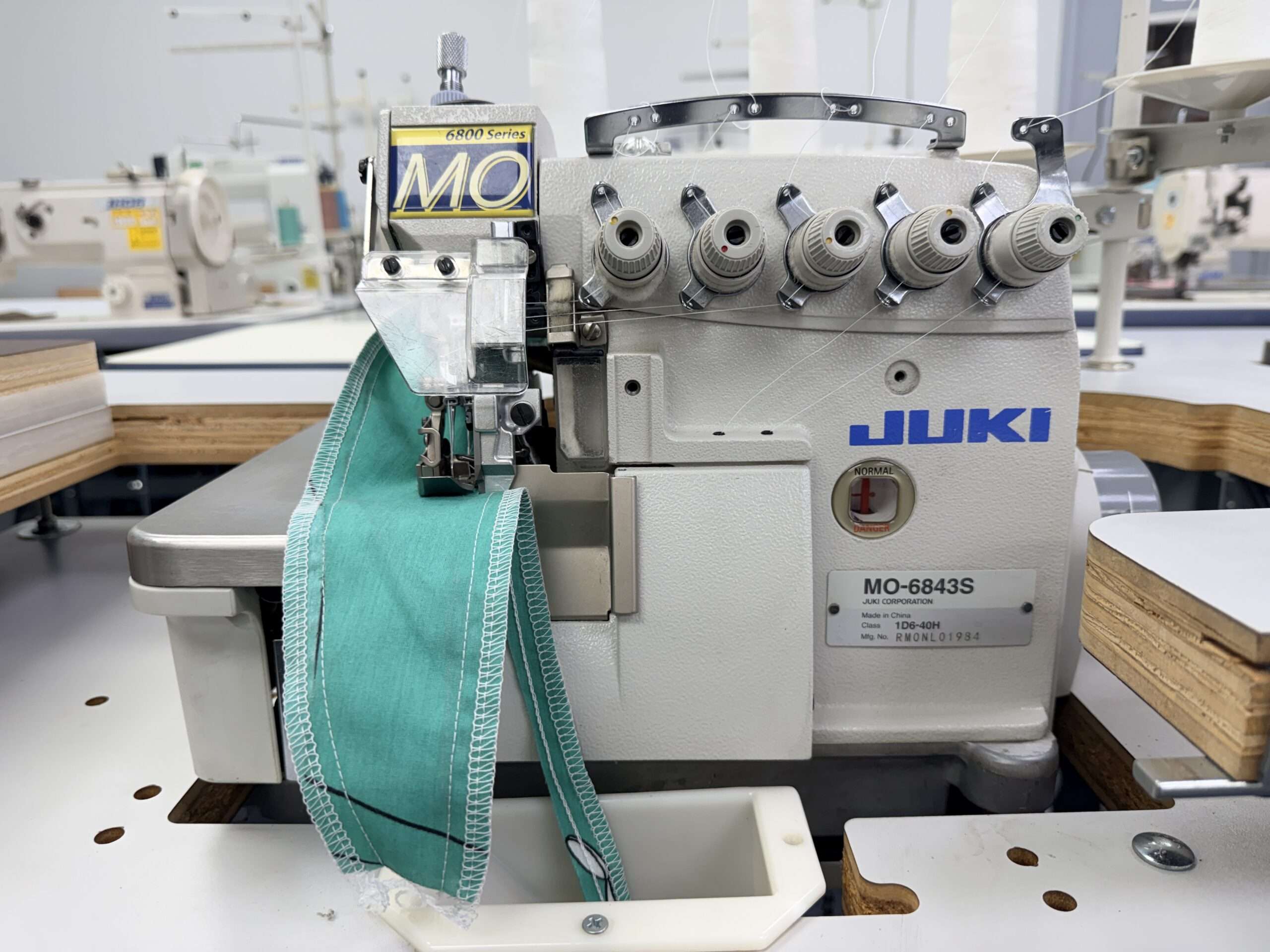 Lightly use MO-6843S is an industrial, three-needle, six-thread overlocker/safety-stitch machine. Call For Price 214-749-7991.