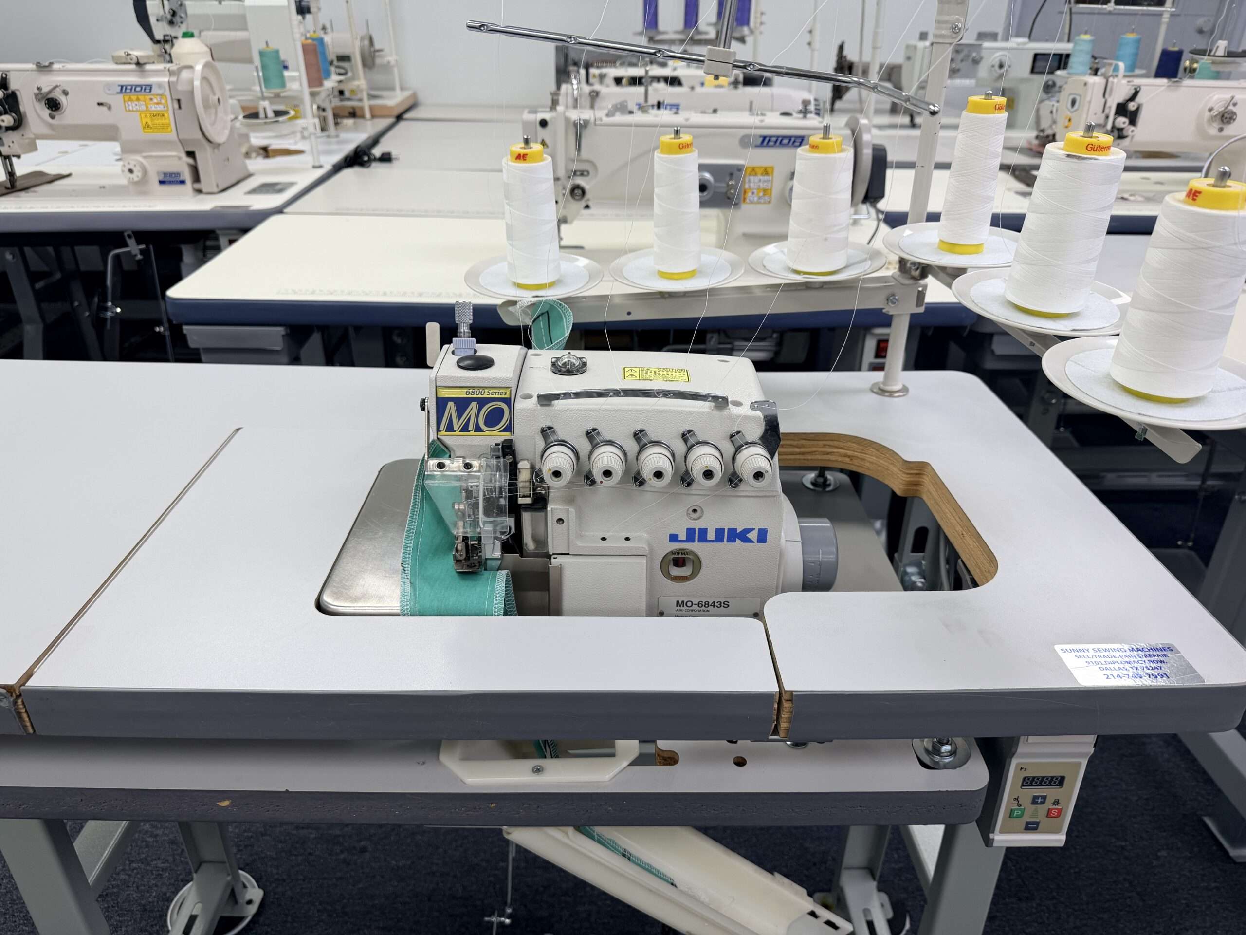 Lightly use MO-6843S is an industrial, three-needle, six-thread overlocker/safety-stitch machine. Call For Price 214-749-7991. - Image 2